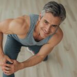 Old-man-moving-his-leg-flexibly-without-pain